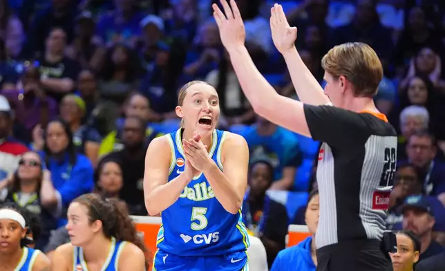 Dallas Wings guard Paige Bueckers (5) reacts to a call during the first half of a WNBA basketball game against the Atlanta Dream in Arlington, Texas, Tuesday, May 12, 2026. (AP Photo/LM Otero)