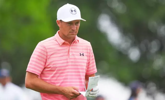 Jordan Spieth looks up as he walks from the 11th tee box during the first round of the Byron Nelson golf tournament in McKinney, Texas, Thursday, May 21, 2026. (AP Photo/LM Otero)