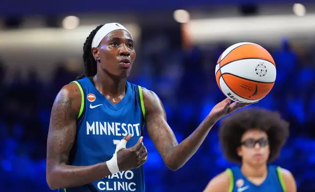 Minnesota Lynx forward Natasha Howard prepares for a free throw during the second half of a WNBA basketball game against the Dallas Wings in Arlington, Texas, Thursday, May 14, 2026. (AP Photo/LM Otero)