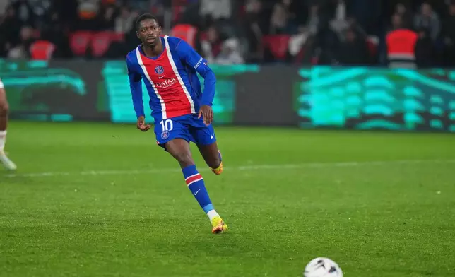 FILE - PSG's Ousmane Dembele runs for the ball during the French League One soccer match between Paris Saint Germain and Brest in Paris, France, Sunday, May 10, 2026. (AP Photo/Thibault Camus, file)