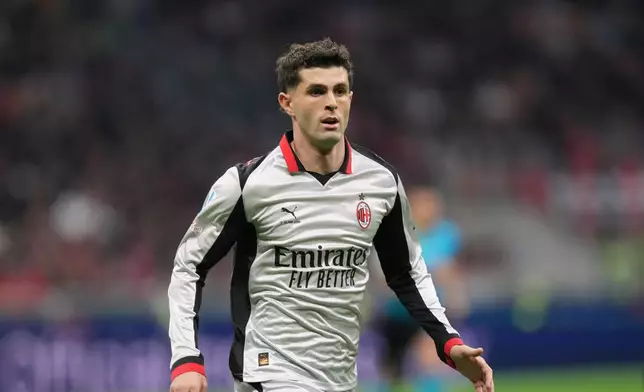 FILE - AC Milan's Christian Pulisic controls the ball during a Serie A soccer match between AC Milan and Torino, in Milan, Italy, Sunday, March 22, 2026. (AP Photo/Luca Bruno, file)