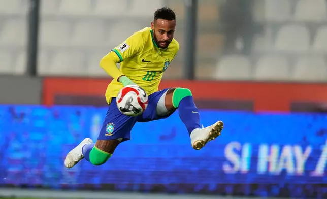 FILE- Brazil's Neymar controls the ball during a World Cup qualifying soccer match against Peru at National stadium in Lima, Peru, Tuesday, Sept. 12, 2023. (AP Photo/Martin Mejia, File)