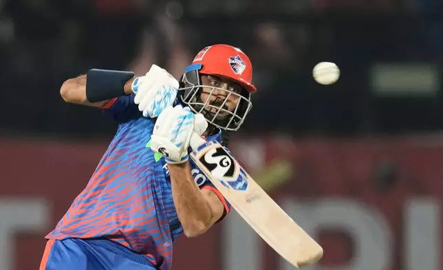 Delhi Capitals' captain Axar Patel plays a shot during the Indian Premier League cricket match between Delhi Capitals and Punjab Kings in Dharamshala, India, Monday, May 11, 2026. (AP Photo/Ashwini Bhatia)