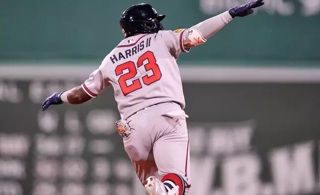 Atlanta Braves' Michael Harris II celebrates while rounding the bases on his two-run home run during the eighth inning of a baseball game against the Boston Red Sox, Tuesday, May 26, 2026, in Boston. (AP Photo/Charles Krupa)