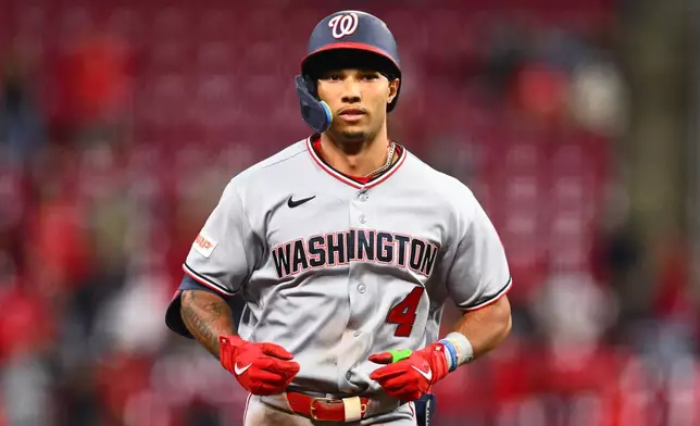 Washington Nationals' Daylen Lile runs the bases after hitting a two-run home run during the tenth inning of a baseball game against the Cincinnati Reds in Cincinnati, Wednesday, May 13, 2026. (AP Photo/Ben Jackson)