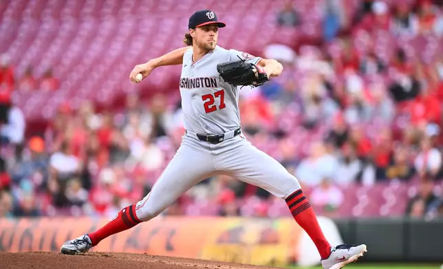 Washington Nationals pitcher Jake Irvin throws during the first inning of a baseball game against the Cincinnati Reds in Cincinnati, Wednesday, May 13, 2026. (AP Photo/Ben Jackson)