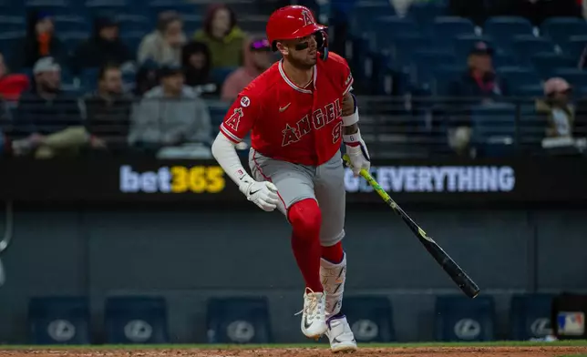 Los Angeles Angels' Zach Neto watches his single off Cleveland Guardians relief pitcher Matt Festa during the seventh inning of a baseball game, Monday, May 11, 2026, in Cleveland. (AP Photo/Phil Long)