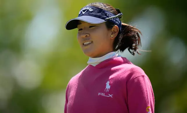 Andrea Lee reacts after sinking her putt on the ninth green during the first round of the Mizuho Americas Open LPGA golf tournament, Thursday, May 7, 2026, in West Caldwell, N.J. (AP Photo/Seth Wenig)