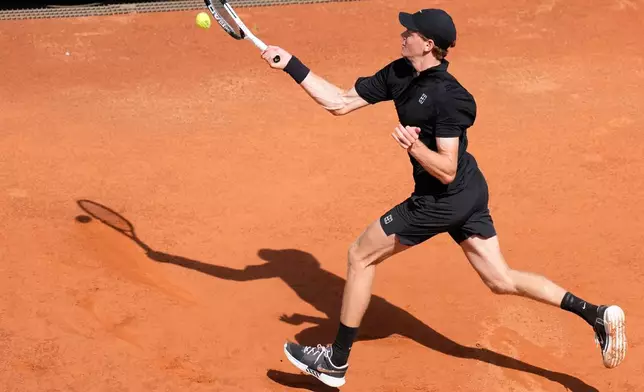 Italy's Jannik Sinner returns the ball to Italy's Andrea Pellegrino, during their match at the Italian Open tennis tournament in Rome, Tuesday, May 12, 2026. (AP Photo/Alessandra Tarantino)