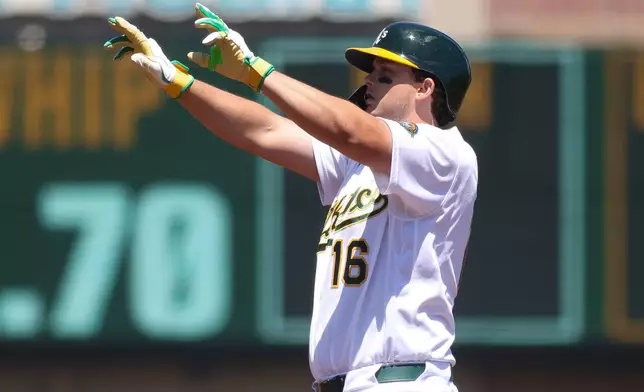 Athletics' Nick Kurtz gestures after hitting an RBI double during the second inning of a baseball game against the Kansas City Royals Thursday, April 30, 2026, in West Sacramento, Calif. (AP Photo/Scott Marshall)