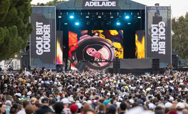FILE - Fisher performs in fan village after the second round of LIV Golf Adelaide at the Grange Golf Club, April 27, 2024, in Adelaide, Australia. (Matt Turner/LIV Golf via AP, File)