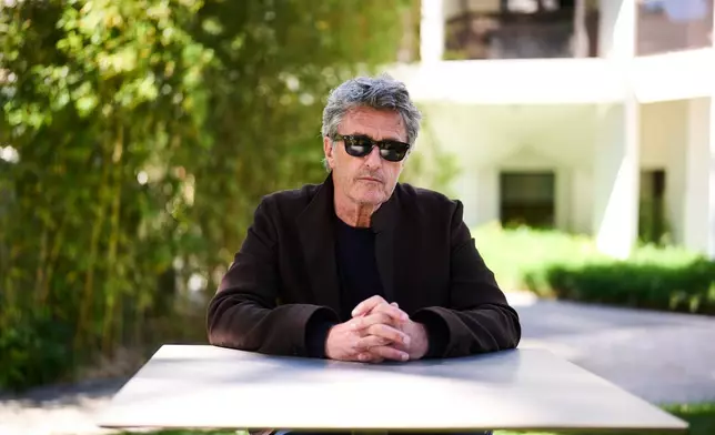 Director Paweł Pawlikowski poses for portrait photographs for the film 'Fatherland' during the 79th international film festival, Cannes, southern France, Saturday, May 16, 2026. (Photo by Scott A Garfitt/Invision/AP)