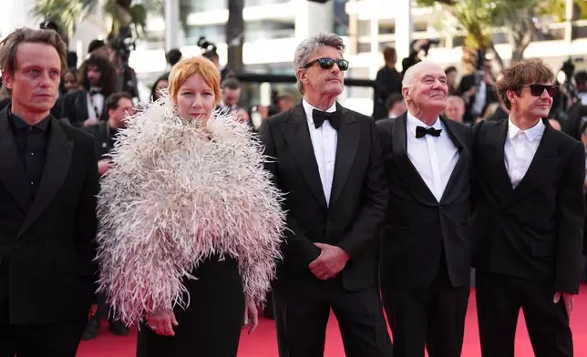 August Diehl, Sandra Hüller, Pawel Pawlikowski, Hanns Zischler and Lukasz Zal pose for photographers upon arrival at the premiere of the film 'Fatherland' at the 79th international film festival, Cannes, southern France, Thursday, May 14, 2026. (Photo by Scott A Garfitt/Invision/AP)