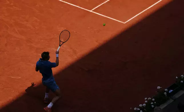 Arthur Gea of France returns to Karen Khachanov of Russia during the first round men's singles tennis match at the French Open tennis tournament in Paris, Sunday, May 24, 2026. (AP Photo/Aurelien Morissard)