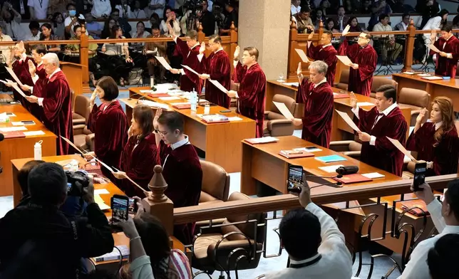 Philippine senators convene as an impeachment court for the trial of Vice President Sara Duterte at the Philippine senate, Monday, May 18, 2026, in Pasay, Philippines. (AP Photo/Aaron Favila)