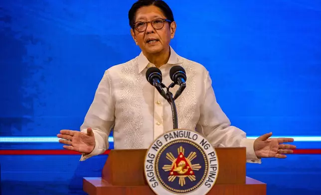 FILE - Philippine President Ferdinand Marcos Jr. speaks during a press conference in Manila, Philippines, on March 25, 2026. (Ezra Acayan/Pool Photo via AP, File)