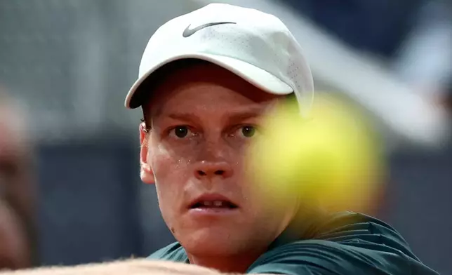 Jannik Sinner of Italy returns the ball to Rafael Jodar of Spain during the Madrid Open tennis tournament in Madrid, Wednesday, April 29, 2026. (AP Photo/Pablo Garcia)