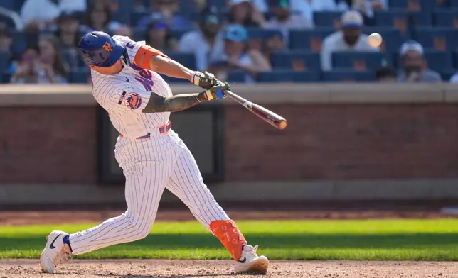 New York Mets' Tyrone Taylor hits a three-run home run during the ninth inning of a baseball game against the New York Yankees, Sunday, May 17, 2026, in New York. (AP Photo/Seth Wenig)