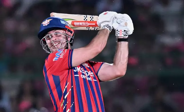 Lucknow Super Giants' Mitchell Marsh plays a shot during the Indian Premier League cricket match between Lucknow Super Giants and Rajasthan Royals in Jaipur, India, Tuesday, May 19, 2026. (AP Photo)