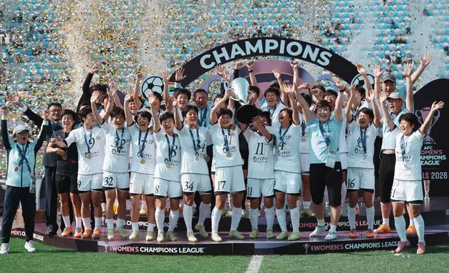 Naegohyang Women's FC's players celebrate on the podium after winning the AFC Women's Champions League soccer final match against Tokyo Verdy Beleza in Suwon, South Korea, Saturday, May 23, 2026. (AP Photo/Lee Jin-man)