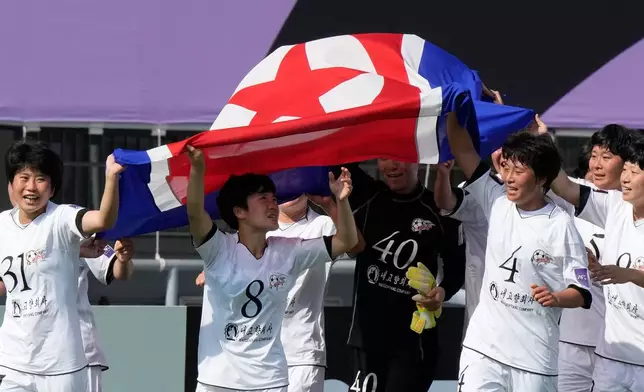 Naegohyang Women's FC's players celebrate after winning the AFC Women's Champions League soccer final match against Tokyo Verdy Beleza in Suwon, South Korea, Saturday, May 23, 2026. (AP Photo/Ahn Young-joon)