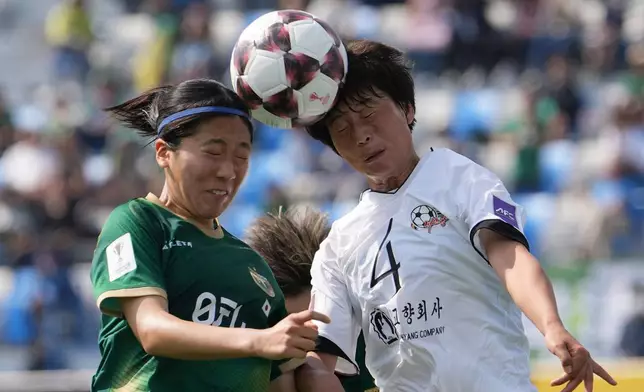 Naegohyang Women's FC's Ri Myong Gum, right, battles for the ball against Tokyo Verdy Beleza's Yuna Aoki during the AFC Women's Champions League soccer final match in Suwon, South Korea, Saturday, May 23, 2026. (AP Photo/Lee Jin-man)