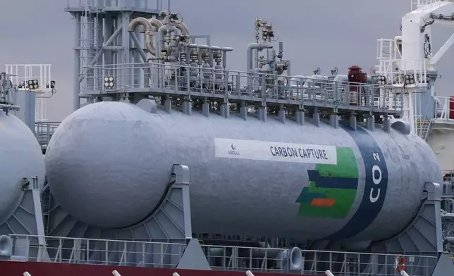 LPG tanker Clipper Eris, which uses onboard carbon capture technologies, is docked at the Port of Antwerp in Zwijndrecht, Belgium, Tuesday, Oct. 21, 2025. (AP Photo/Virginia Mayo)
