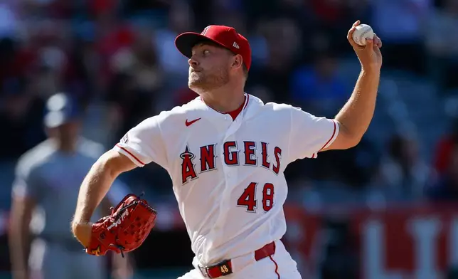Los Angeles Angels starting pitcher Reid Detmers pitches during the first inning of a baseball game against the Texas Rangers, Sunday, May 24, 2026, in Anaheim, Calif. (AP Photo/Caroline Brehman)