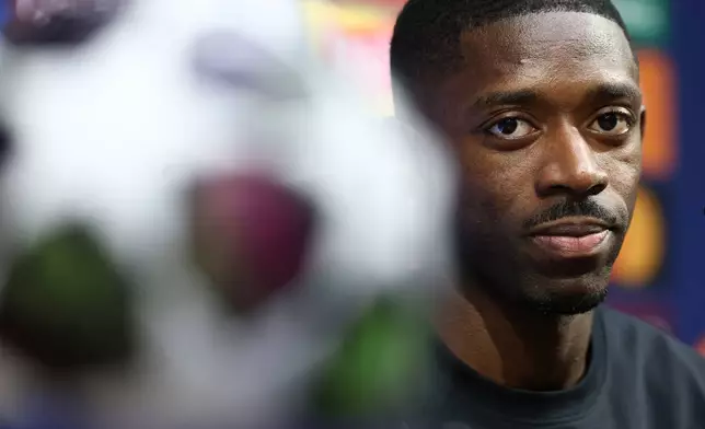 Paris Saint-Germain's Ousmane Dembele meets the media ahead of the Champions League final soccer match between Paris Saint-Germain (PSG) and Arsenal, in Budapest, Friday 29, 2026. (Franck Fife, Pool Photo via AP)