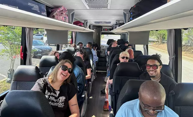 Voting rights and democracy activists ride together from Atlanta to Montgomery, Ala., on Saturday, May 16, 2026, for a rally against efforts by Republican legislative majorities to reduce Black representation in Congress from Southern states. (AP Photo/Bill Barrow)