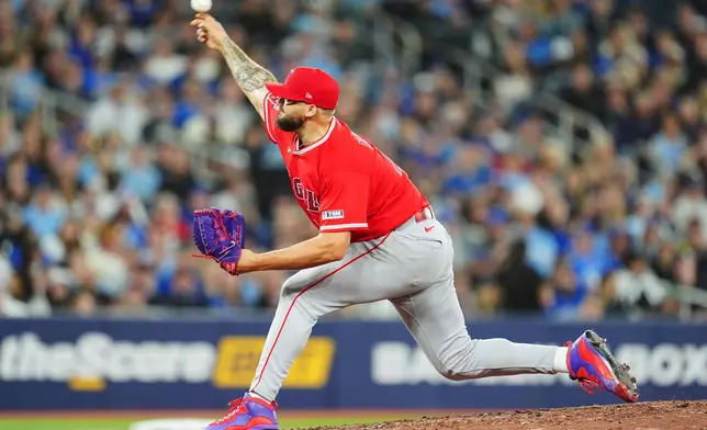 Los Angeles Angels pitcher Alek Manoah works against the Toronto Blue Jays during the eighth inning of a baseball game in Toronto, Friday, May 8, 2026. (Frank Gunn/The Canadian Press via AP)