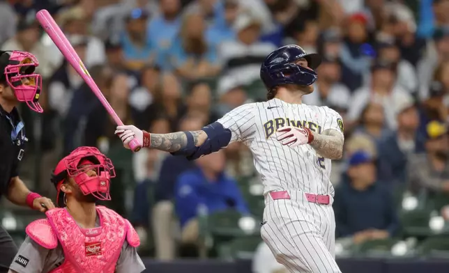 Milwaukee Brewers' Brice Turang watches his walk off home run in the ninth inning against the New York Yankees, Sunday, May 10, 2026, in Milwaukee. (AP Photo/Jeffrey Phelps)