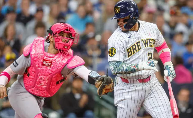 New York Yankees catcher J.C Escarra tags out Milwaukee Brewers' William Contreras after he struck out during the first inning of a baseball game Sunday, May 10, 2026, in Milwaukee. (AP Photo/Jeffrey Phelps)