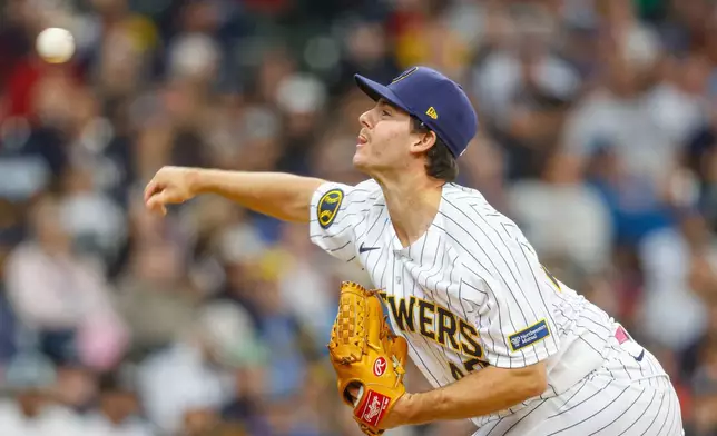 Milwaukee Brewers pitcher Logan Henderson (43) throws to the New York Yankees during the first inning of a baseball game Sunday, May 10, 2026, in Milwaukee. (AP Photo/Jeffrey Phelps)