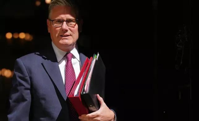 FILE - Britain's Prime Minister Keir Starmer leaves 10 Downing Street in London on April 29, 2026. (AP Photo/Kirsty Wigglesworth, File)