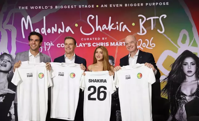 From left, Kaká, Hugh Evans, Shakira, and Gianni Infantino pose for a photo after a panel on the 2026 FIFA World Cup soccer tournament halftime show during the Global Citizen NOW summit, Thursday, May 14, 2026, in New York. (AP Photo/Heather Khalifa)