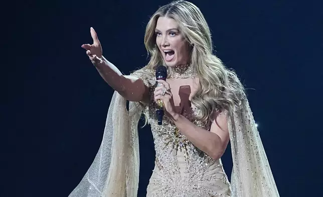 Delta Goodrem from Australia performs the song "Eclipse" during the second semifinal of the 70th Eurovision Song Contest in Vienna, Austria, Thursday, May 14, 2026. (AP Photo/Martin Meissner)
