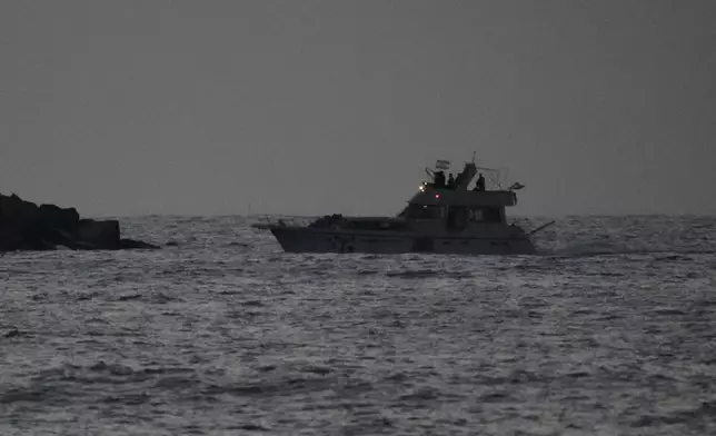 Israeli naval forces sail a confiscated Gaza-bound flotilla boat into Israel's Ashdod port after intercepting the vessel on the Mediterranean Sea, Tuesday, May 19, 2026. (AP Photo/Ariel Schalit)