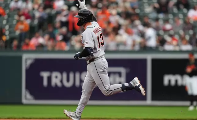 Detroit Tigers' Dillon Dingler rounds the bases after hitting a two-run home run during the first inning in the second baseball game of a doubleheader against the Baltimore Orioles, Sunday, May 24, 2026, in Baltimore. (AP Photo/Stephanie Scarbrough)