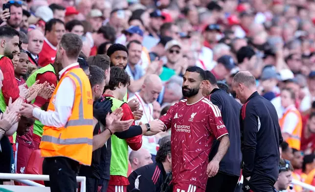 Liverpool's Mohamed Salah is substituted off on his final appearence during the Premier League match between Liverpool and Brentford, in Liverpool, England, Sunday May 24, 2026. (Peter Byrne/PA via AP)