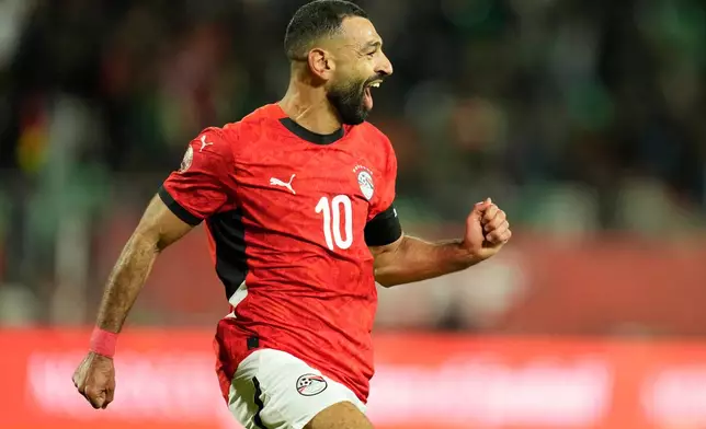 FILE - Egypt's Mohamed Salah celebrates after scoring his side's third goal during the Africa Cup of Nations round of 16 soccer match between Egypt and Benin in Agadir, Morocco, Monday, Jan. 5, 2026. (AP Photo/Mosa'ab Elshamy, File)