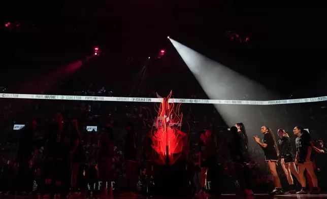 Portland Fire players are introducted before a WNBA basketball game against the Chicago Sky, on Saturday, May 9, 2026, in Portland, Ore. (AP Photo/Jenny Kane, File)