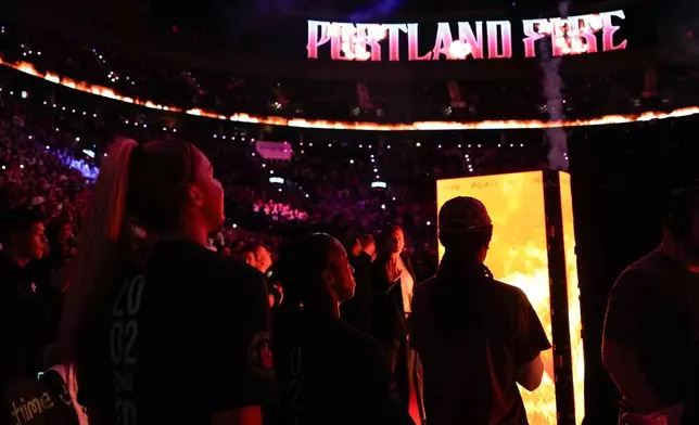 Portland Fire players are introduced before a WNBA basketball game against the Chicago Sky, Saturday, May 9, 2026, in Portland, Ore. (AP Photo/Jenny Kane, File)