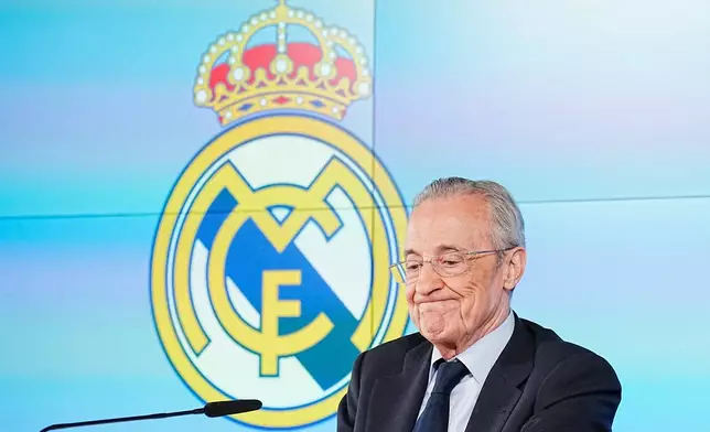 Real Madrid president Florentino Perez gestures during a press conference in Madrid, Tuesday, May 12, 2026. (AP Photo/Bernat Armangue)