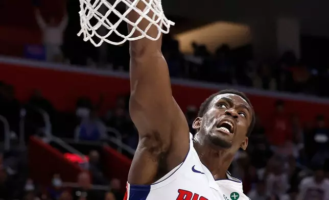 Detroit Pistons center Jalen Duren dunks against the Orlando Magic during the first half in Game 7 of a first-round NBA basketball playoffs series Sunday, May 3, 2026, in Detroit. (AP Photo/Duane Burleson)