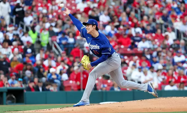 Los Angeles Dodgers pitcher Roki Sasaki throws during the first inning of a baseball game against the St. Louis Cardinals, Saturday, May 2, 2026, in St. Louis. (AP Photo/Scott Kane)