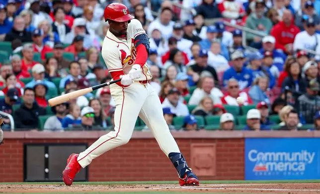St. Louis Cardinals' Jordan Walker hits a single during the first inning of a baseball game against the Los Angeles Dodgers Saturday, May 2, 2026, in St. Louis. (AP Photo/Scott Kane)