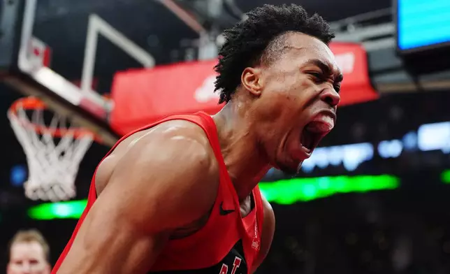 Toronto Raptors' Scottie Barnes celebrates after a play against the Cleveland Cavaliers during the first half of Game 6 in the first round of an NBA basketball playoffs series in Toronto, Friday, May 1, 2026. (Frank Gunn/The Canadian Press via AP)