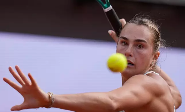 Belarus' Aryna Sabalenka returns the ball to Romania's Sorana Cirstea during their match at the Italian Open tennis tournament in Rome, Saturday, May 9, 2026. (AP Photo/Alessandra Tarantino)