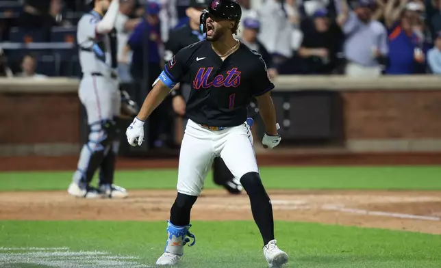 New York Mets' MJ Melendez reacts after hitting a walkoff two-run home run during the 10th inning of a baseball game against the Miami Marlins, Friday, May 29, 2026, in New York. (AP Photo/Pamela Smith)